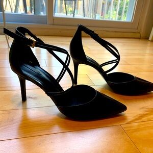 Beautiful Aldo High heel shoes with criss cross straps.